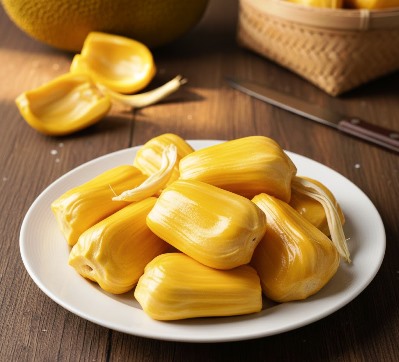 Ripe jackfruits in a plate to prepare Delicious Instant Eggless Jackfruit Pudding 